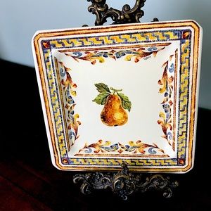 Plate made in Italy and 12 in bronze plate stand.